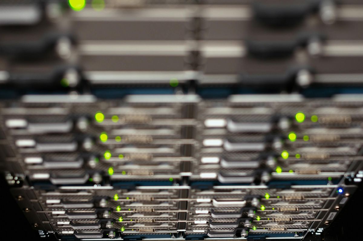 Server infrastructure with active status lights representing modern technical leverage inside the delivery system