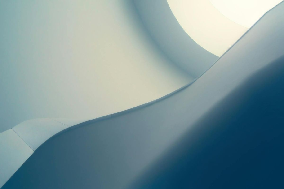 Curved architectural structure representing system design, coherence, and connected execution